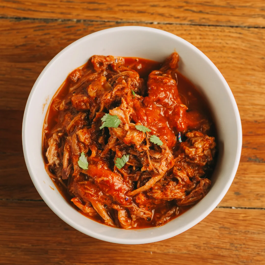 Nhdesign project SMASH VS THREAT: Bowl with seasoned shredded meat in Mexican style