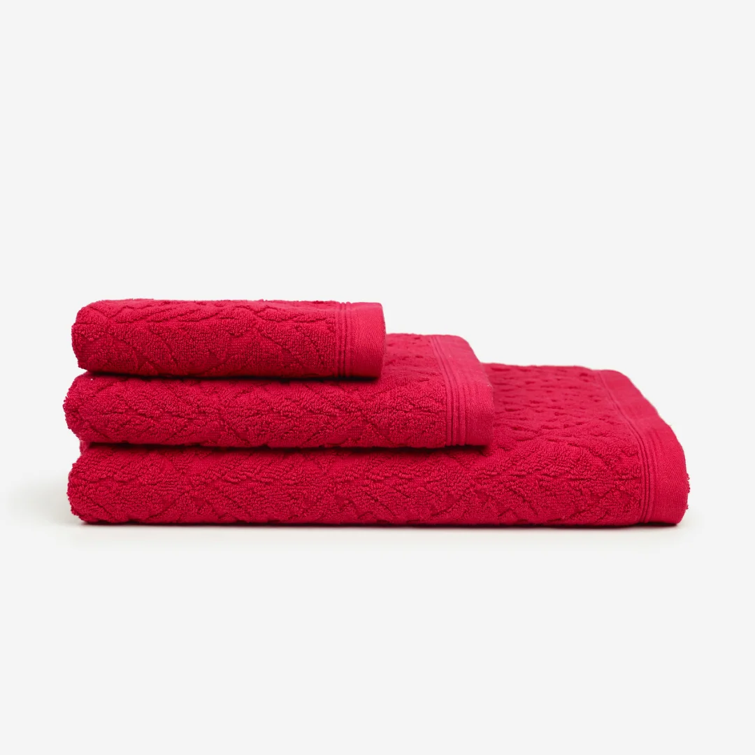 Nhdesign project Kazley: Two folded red Kazley towels on white background