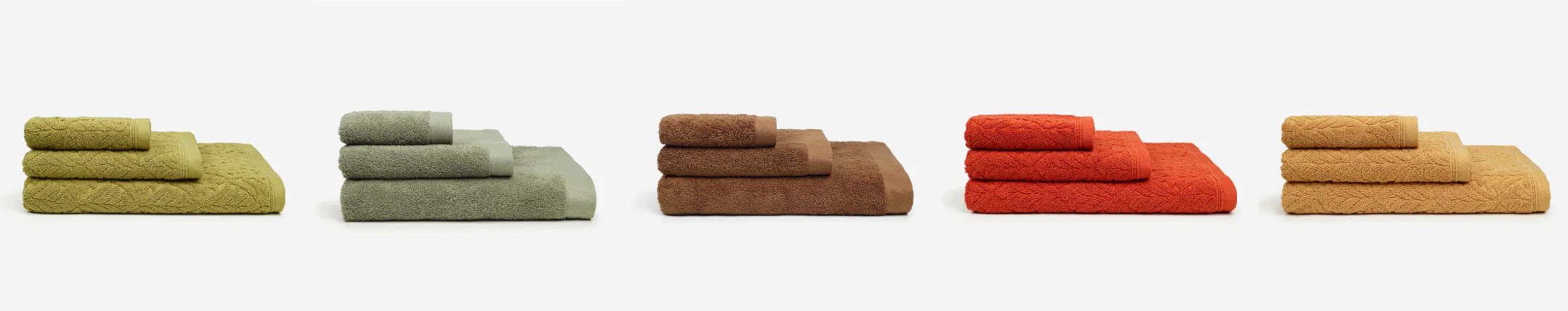 Nhdesign project Kazley: Kazley towels in multiple colours displayed in alignment on neutral background