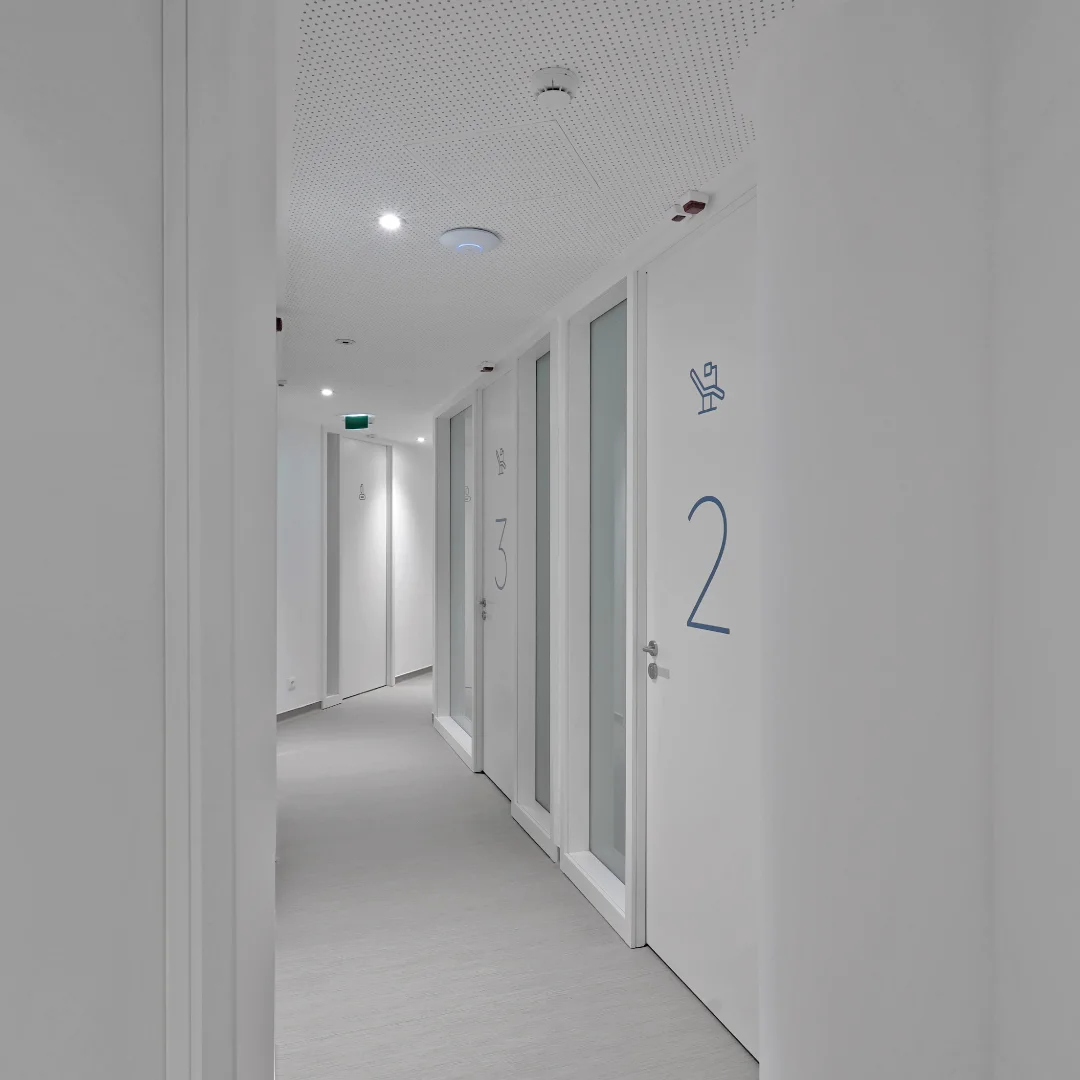 Nhdesign project OCEANUS: Corridor of Oceanus Oral Center clinic with numbered doors