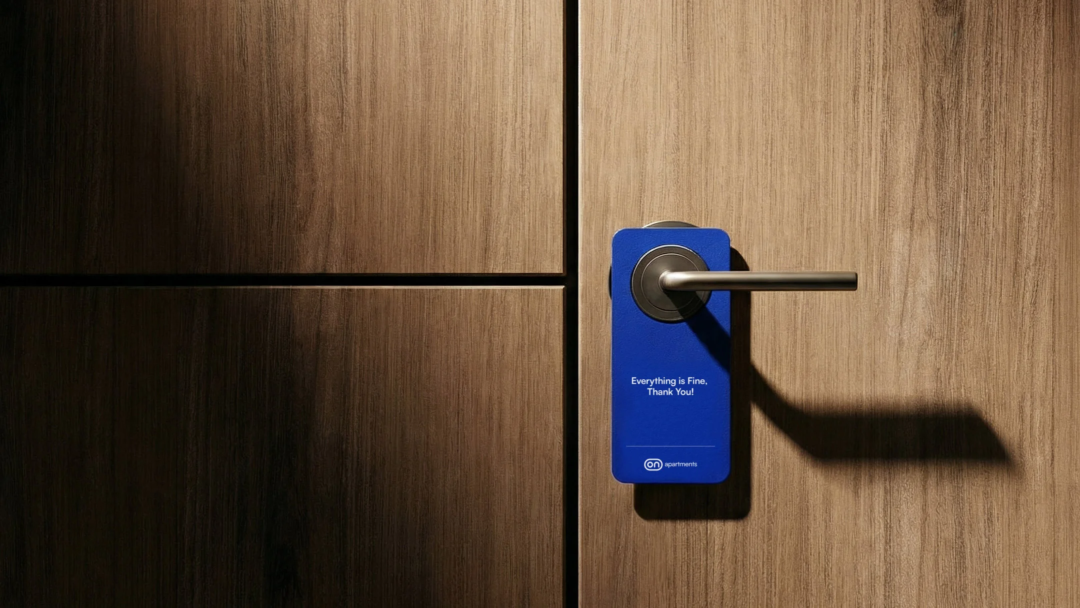 Nhdesign project ON: ON brand applied to a door hanger for accommodation