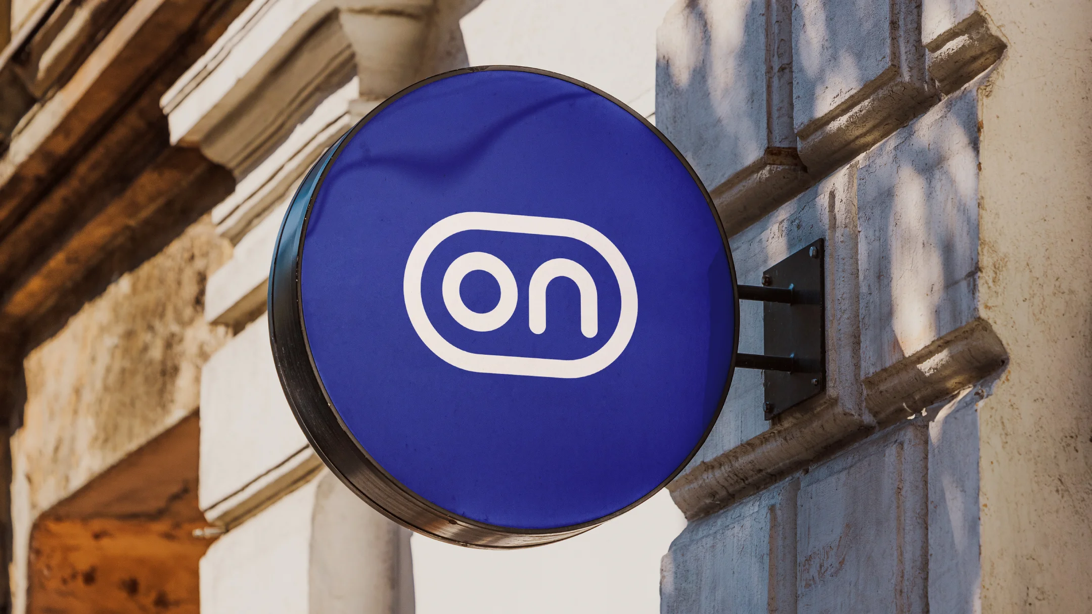 Nhdesign project ON: Exterior sign featuring the ON logo in a circular application