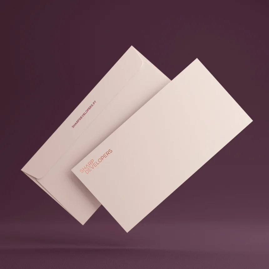 Nhdesign project Sharp Developers: Brand envelope with company information on a purple background.