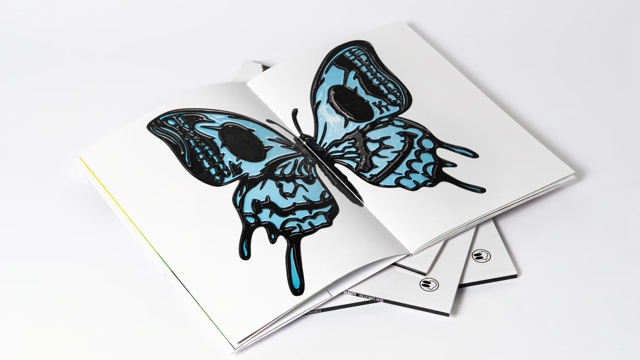 Projeto Collateral Beauty da Nhdesign: Composição editorial das páginas interiores do catálogo Killa Was Here